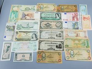 lot 411 image: Lot of Foreign Currency See Photos