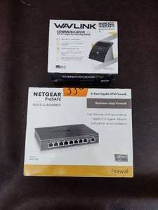 lot 33 image: WAVLINK communicator C2 USB 3.0 Single bay docking station and net gear pro safe model no. FVS318G.