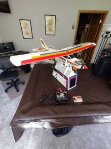 lot 4 image: Remote Control Airplane with Caddy