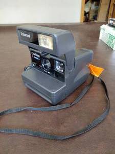 lot 38 image: Vintage Polaroid camera (works with film)