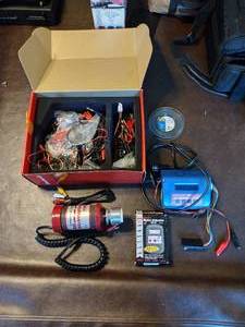 lot 36 image: Hobbico Torqmaster 12 volt starter, digital volt meter, ez peak plus Etc