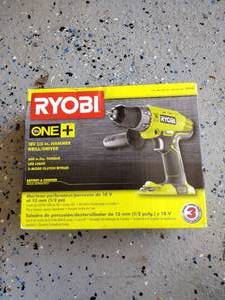 lot 43 image: NIB Ryobi one 18v  hammer drill driver