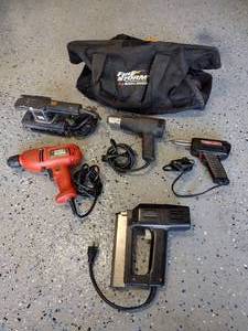 lot 49 image: Tool lot welding gun, heat gun, sander, impact wrench, and stapler