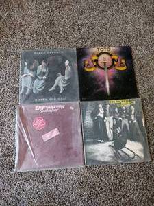 lot 30A image: 4 Vintage Records Black Sabbath Heaven and Hell, Toto, Eric Clapton Another Ticket & The Rockets No Ballads.