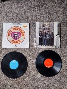 lot 69 image: 2 records SGT peppers lonely hearts club, and beetles hey Jude