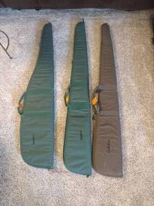 lot 100 image: 2 Gun mate gun case (green) and  Cabelas brown gun case