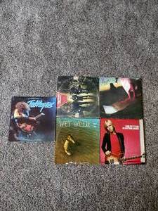 lot 65 image: 5 records Ted Nugent epic record, wet Willie II capricorn records, tom petty and the heart breakers, corner stone Styx, and edger winters white trash.