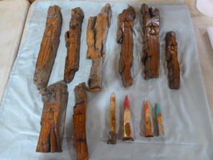 lot 48 image: 12 Hand-Carved Wooden Gnomes