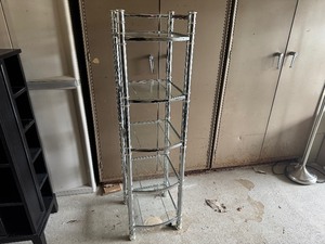 lot 25 image: Five Tiered Silver and Glass Shelf (13 x 14 x 51)