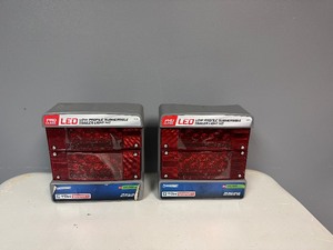 lot 48 image: Pair of Waterproof Pro Class LED Low Profile Submersible Trailer Light Kits