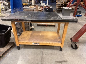 lot 100 image: Industrial Wood Task Table with Plastic Guard and attached Steel Piece (60 x 36 x 38.5)