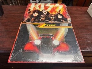lot 138 image: Rock 16 x 12 Tin Signs - KISS and ZZTOP