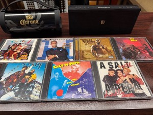 lot 141 image: Two Wireless Speakers and Seven Mostly Hip Hop CDs - SaltNPepa, MC Hammer, Flo Rider