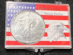 lot 15 image: 1994 AMERICAN SILVER EAGLE 1 TROY OZ .999 FINE SILVER IN CASE