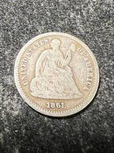 lot 48 image: 1861 US SEATED LIBERTY HALF DIME