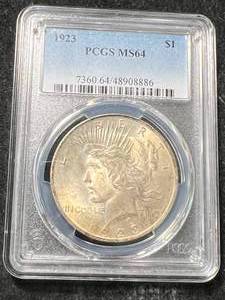 lot 79 image: 1923 US PEACE SILVER DOLLAR PCGS MS64