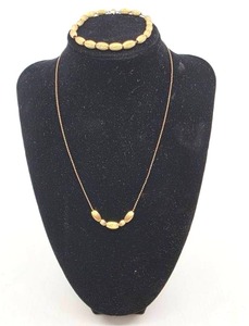 lot 83 image: 12K Necklace & Bracelet Pair- 7.79 grams