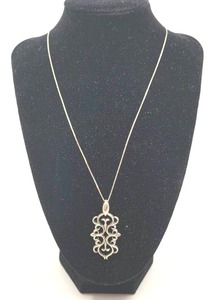 lot 102 image: Sterling Silver Chain with Filigree Scroll Pendant
