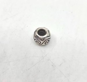 lot 152 image: Pandora Sterling Silver Swirl Charm