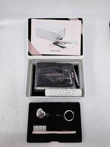 lot 187 image: Pandora Collectors Cleaning & Storage Kit with Heart Logo Keychain