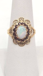 lot 8 image: Beautiful Opal and Garnet Ring Set in 10K Yellow Gold - Size 6.75
