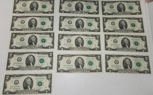 lot 209 image: Lot of 13 Uncirculated 2013 $2 Bills - 9 Sequential Serial Numbers in One Group