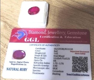 lot 218 image: Beautiful 7.02 Carat Oval Ruby w COA