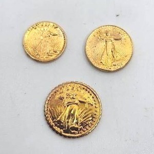 lot 223 image: 3 Piece Saint Gaudens $20 Gold Coin Miniatures - 1.13g