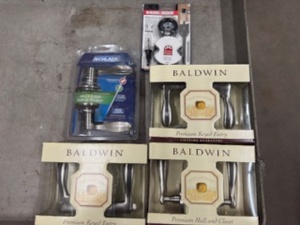 lot 49 image: Two Baldwin Premium Keyed Entry Door Handle, One Baldwin Closet Door Handle, Shlage Door Lock, Black and Decker