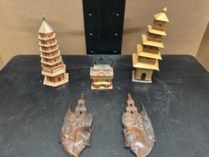 lot 33 image: Vintage Small Asian Model Buildings, Pair of Vintage Thai Carved Wood Deity Head Wall Hangings