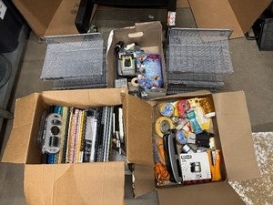 lot 86 image: Three Boxes of Office Supplies, Adding Machines, Calculator, Pencil Sharpeners, Sheet Covers, Notebooks, Two Matching Metal Hanging File Organizers and more