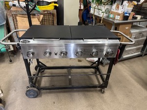 lot 102 image: Aussie 6 Burner Gas Grill with Customized Stainless Steel Cover and Three ServingPrep Pieces