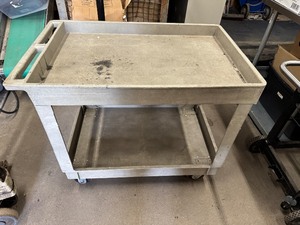 lot 110 image: Rubbermaid Cart (One wheel is cracked but still rolls fairly well). 40 X 25 X 23
