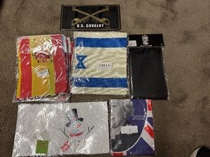 lot 115 image: Ten Flags, Winter Window Cling and Us Calvary License Plate Cover