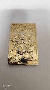 lot 27 image: Rare 1999 Collectors Gold Pokemon Mewtwo Token - 57.17g