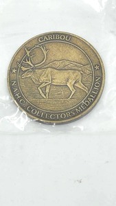 lot 10 image: North American Hunting Club - Big Game Collectors Series Medallion - Caribou