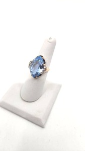 lot 112 image: Stunning 10k Yellow Gold and 15 Carat Blue Topaz Cocktail Ring - Size 6.25