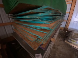 lot 213 image: 4x8 plywood bundle