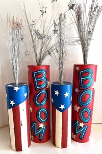lot 10 image: Set of 4 Pier One Patriotic Themed Decorative Firecracker Centerpieces