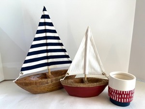 lot 12 image: Set of 2 Wooden Sailboat Decor with Nautical Striped Sails & Ceramic Vase