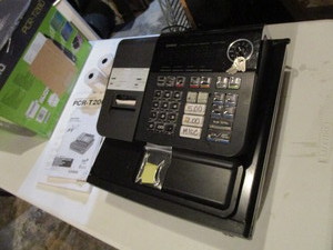 lot 15 image: Used Casio Cash Register