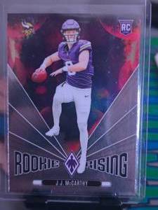 lot 72 image: JJ MCCARTHY 2024 PANINI PHOENIX ROOKIE RISING ROOKIE CARD