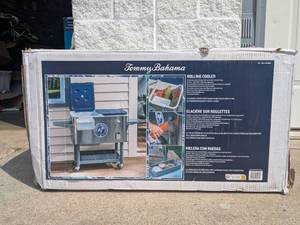 lot 31 image: TOMMY BAHAMA 100QT. ROLLING COOLER