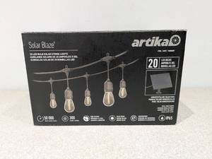lot 51 image: NEW ARTIKA SOLAR BLAZE 20 LED BULB & SOLAR STRING LIGHTS