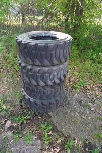 lot 11 image: 4 - Bobcat Bead Guard Heavy Wall Skid Loader Tires