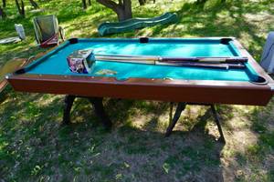 lot 30 image: Regulation Pool Table With Set of Balls and Assorted Cue Sticks