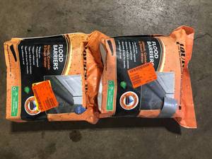 lot 26 image: Lot of Quick Dam Water Activated 17 ft. Flood Barrier (1-Pack) Customer Returns See Pictures