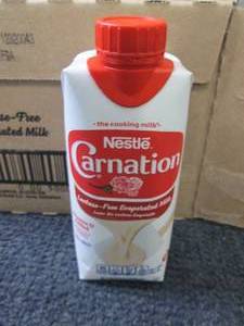lot 37 image: 8- 11 oz Carnation Lactose Free Eva...