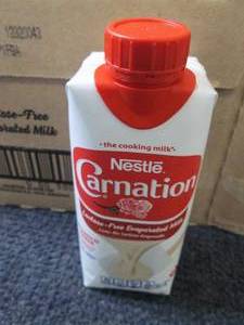 lot 38 image: 8- 11 oz Carnation Lactose Free Eva...