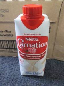 lot 39 image: 8- 11 oz Carnation Lactose Free Eva...